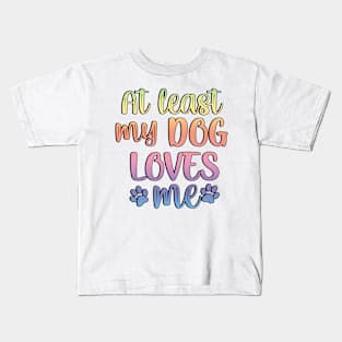 At least my dog loves me Kids T-Shirt